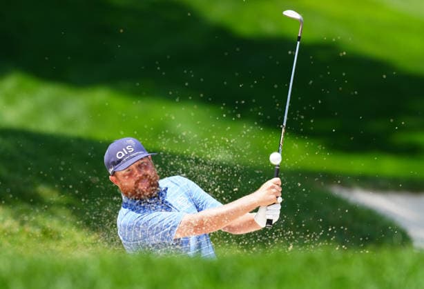 SILVIS, IL - JULY 05: PGA, Golf Herren golfer Zac Blair plays a sand shot out of a green side bunker on the 9th hole during the final round of the John Deere Classic on July 5, 2026, at TPC Deere Run in Silvis, Illinois. (Photo by Brian Spurlock Icon Sportswire) GOLF: JUL 05 PGA John Deere Classic EDITORIAL USE ONLY Icon26070566