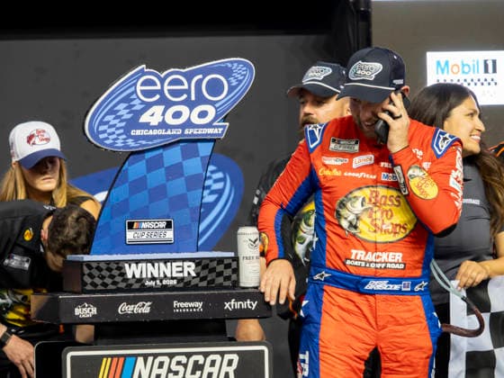 JOLIET, IL - JULY 05: Chase Briscoe ( 19 Joe Gibbs Racing Bass Pro Shops Toyota) answers his smart phone after winning the NASCAR, Motorsport, USA Cup Series eero 400 on July 5, 2026, at Chicagoland Speedway in Joliet, IL. (Photo by Joseph Weiser Icon Sportswire) AUTO: JUL 05 NASCAR Cup Series eero 400 EDITORIAL USE ONLY Icon260705055400