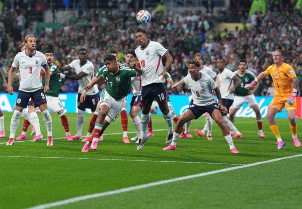 (260706) -- MEXICO CITY, July 6, 2026 -- Jude Bellingham (C) of England jumps for a header during the round of 16 match between Mexico and England at the 2026 FIFA World Cup, WM, Weltmeisterschaft, Fussball at the Mexico City Stadium, Mexico, July 5, 2026. (Photo by Xinhua) (SP)MEXICO-MEXICO CITY-FOOTBALL-FIFA WORLD CUP-ROUND OF 16-MEX VS ENG MartinxZabala 