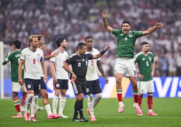(260706) -- MEXICO CITY, July 6, 2026 -- Raul Jimenez (R, front) of Mexico reacts after Jarell Quansah of England receives a red card during the round of 16 match between Mexico and England at the 2026 FIFA World Cup, WM, Weltmeisterschaft, Fussball at the Mexico City Stadium, Mexico, July 5, 2026. ) (SP)MEXICO-MEXICO CITY-FOOTBALL-FIFA WORLD CUP-ROUND OF 16-MEX VS ENG WuxWei 
