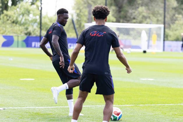 July 4, 2026, Seattle, Washington, USA: United States of America forward Folarin Balogun (20) and United States of America midfielder Weston McKennie (8) warm up in their final team practice before their game at the USA national team, Nationalteam Training which took place at University of Washington Soccer Stadium. Seattle USA - ZUMAl181 20260704_zsp_l181_063 Copyright: xMelissaxLevinx