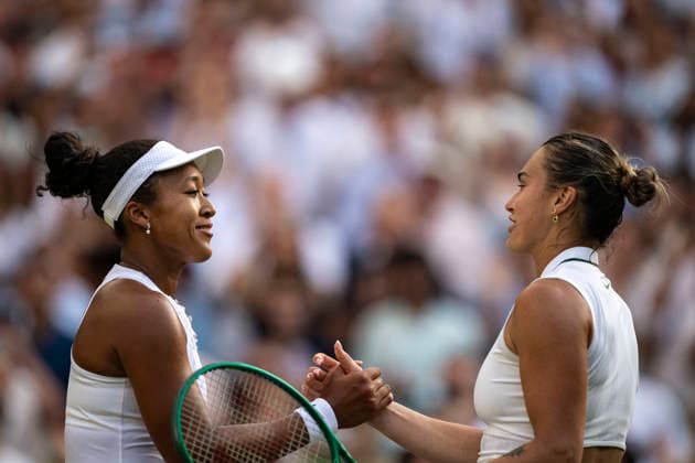 (260706) -- LONDON, July 6, 2026 -- Osaka Naomi (L) greets Aryna Sabalenka after the women s singles fourth round match between Osaka Naomi of Japan and Aryna Sabalenka of Belarus at the Wimbledon Tennis Championships in London, Britain, on July 5, 2026. (Photo by Xinhua) (SP)BRITAIN-LONDON-TENNIS-WIMBLEDON-WOMEN S SINGLES StephenxChung 