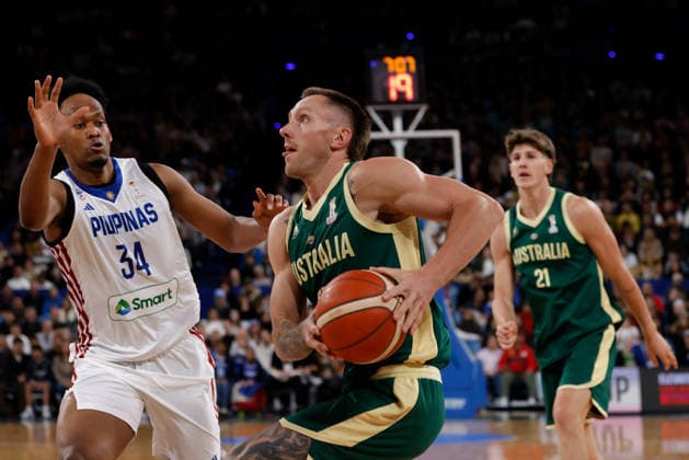 BASKETBALL AUSTRALIA PHILIPPINES, Mitch Creek of the Australian Boomers drives to the basket during the World Cup qualifier basketball match between Australia and the Philippines at RAC Arena in Perth, Monday, July 6, 2026. ( NO ARCHIVING, EDITORIAL USE ONLY PERTH WESTERN AUSTRALIA AUSTRALIA  Copyright: xRICHARDxWAINWRIGHTx 20260706172516244084