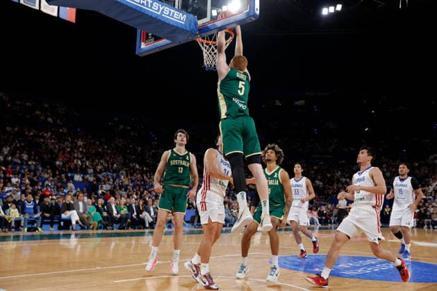 BASKETBALL AUSTRALIA PHILIPPINES, Angus Glover of the Australian Boomers scores a basket during the World Cup qualifier basketball match between Australia and the Philippines at RAC Arena in Perth, Monday, July 6, 2026. ( NO ARCHIVING, EDITORIAL USE ONLY PERTH WESTERN AUSTRALIA AUSTRALIA  Copyright: xRICHARDxWAINWRIGHTx 20260706164847409908