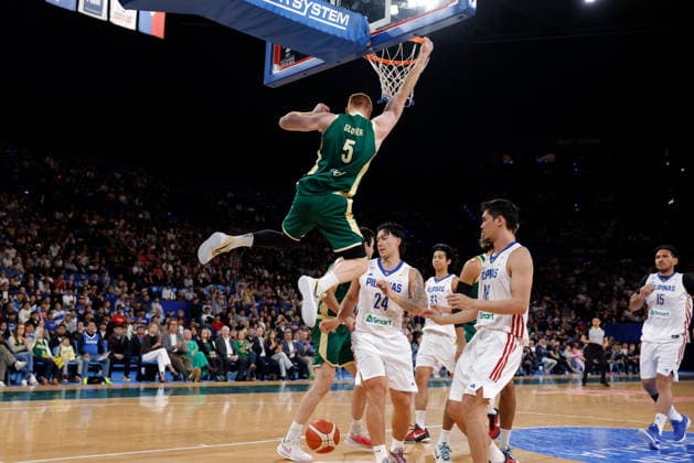 BASKETBALL AUSTRALIA PHILIPPINES, Angus Glover of the Australian Boomers hangs after scoring a basket during the World Cup qualifier basketball match between Australia and the Philippines at RAC Arena in Perth, Monday, July 6, 2026. ( NO ARCHIVING, EDITORIAL USE ONLY PERTH WESTERN AUSTRALIA AUSTRALIA  Copyright: xRICHARDxWAINWRIGHTx 20260706197242359680