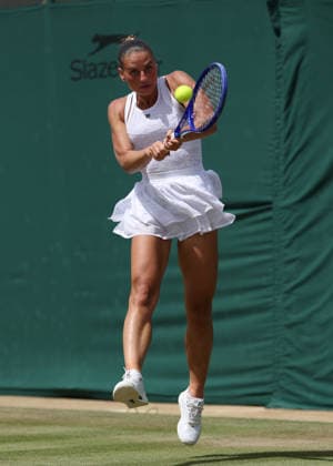 6th July 2026; All England Lawn Tennis and Croquet Club, London, England; Wimbledon Tennis Tournament, Day Eight; Marta Kostyuk (UKR) with a backhand shot to Ashlyn Krueger (USA) JohnxPatrickxFletcher
