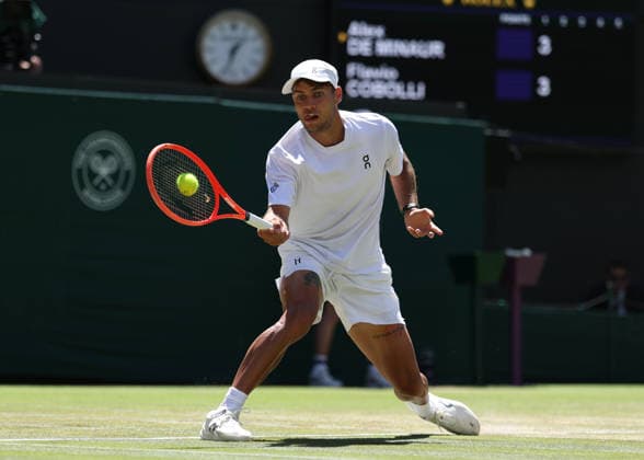 6th July 2026; All England Lawn Tennis and Croquet Club, London, England; Wimbledon Tennis Tournament, Day Eight; Flavio Cobolli (ITA) with a forehand shot to Alex De Minar (AUS) JohnxPatrickxFletcher