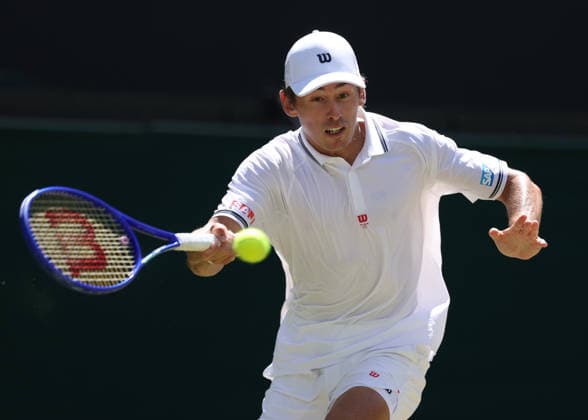 6th July 2026; All England Lawn Tennis and Croquet Club, London, England; Wimbledon Tennis Tournament, Day Eight; Alex De Minar (AUS) with a forehand shot to Flavio Cobolli (ITA) JohnxPatrickxFletcher