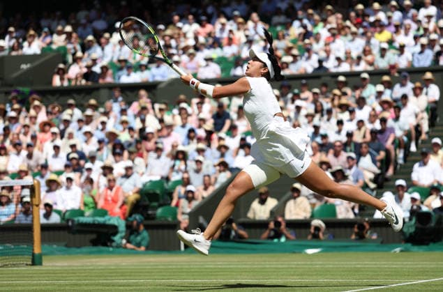 Philippines Alexandra Eala plays a forehand in her match against Italian Jasmine Paolini at Wimbledon on day eight of the 2026 Wimbledon Championships in London on Monday, July 06, 2026.  LON2026070615 HUGOxPHILPOTT