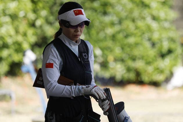 IPA86441105 - Gao Jinmei of China ejects shells from a shotgun during the second day of the ISSF World Cup Shotgun competition at the Concaverde Shooting Range on July 6, 2026, in Lonato del Garda, Italy.  Copyright: xRichardxMorgano IPAxSportx xx 86441105
