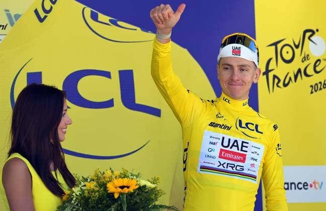 Slovenian Tadej Pogacar of UAE Team Emirates XRG celebrates on the podium in the yellow jersey of leader in the overall ranking after stage 3 of the 2026 Tour de France cycling race, a stage of 195,9km from Granollers, Spain, to Les Angles, France, Monday 06 July 2026. The 113th edition of the Tour de France starts on Saturday 4 July in Barcelona, Spain, and will finish in Paris, France on the 26th of July. DAVIDxPINTENS  x180516745x