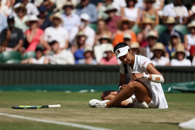 6th July 2026; All England Lawn Tennis and Croquet Club, London, England; Wimbledon Tennis Tournament, Day Eight; Alexandra Eala (PHL) slips on the court in her match against Jasmine Paolini (ITA) JohnxPatrickxFletcher