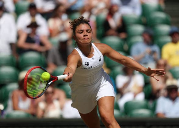 6th July 2026; All England Lawn Tennis and Croquet Club, London, England; Wimbledon Tennis Tournament, Day Eight; Jasmine Paolini (ITA) with a forehand shot to Alexandra Eala (PHL) JohnxPatrickxFletcher