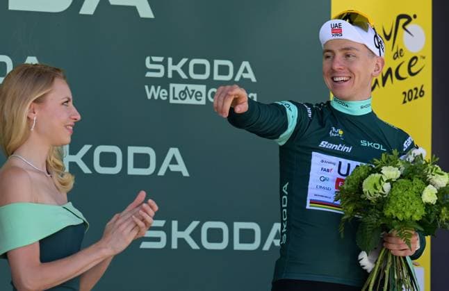 Slovenian Tadej Pogacar of UAE Team Emirates XRG celebrates on the podium in the green jersey of leader in the sprint ranking after stage 3 of the 2026 Tour de France cycling race, a stage of 195,9km from Granollers, Spain, to Les Angles, France, Monday 06 July 2026. The 113th edition of the Tour de France starts on Saturday 4 July in Barcelona, Spain, and will finish in Paris, France on the 26th of July. DAVIDxPINTENS  x180517285x
