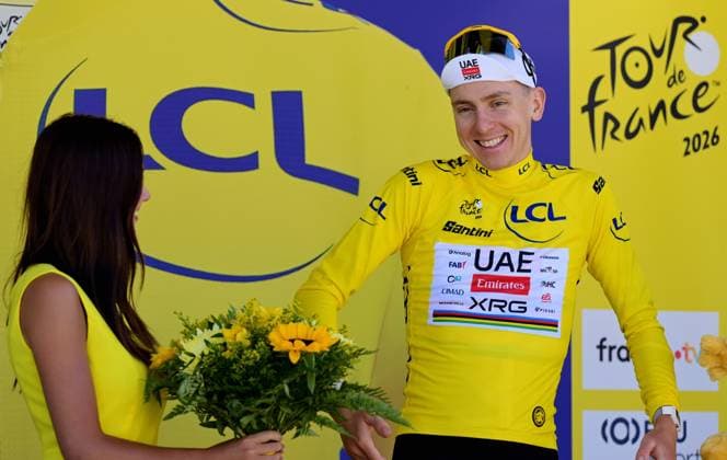Slovenian Tadej Pogacar of UAE Team Emirates XRG celebrates on the podium in the yellow jersey of leader in the overall ranking after stage 3 of the 2026 Tour de France cycling race, a stage of 195,9km from Granollers, Spain, to Les Angles, France, Monday 06 July 2026. The 113th edition of the Tour de France starts on Saturday 4 July in Barcelona, Spain, and will finish in Paris, France on the 26th of July. DAVIDxPINTENS  x180517634x