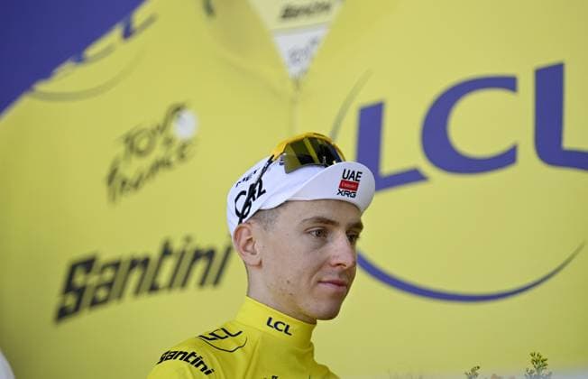 Slovenian Tadej Pogacar of UAE Team Emirates XRG celebrates on the podium in the yellow jersey of leader in the overall ranking after stage 3 of the 2026 Tour de France cycling race, a stage of 195,9km from Granollers, Spain, to Les Angles, France, Monday 06 July 2026. The 113th edition of the Tour de France starts on Saturday 4 July in Barcelona, Spain, and will finish in Paris, France on the 26th of July. JASPERxJACOBS  x180518643x
