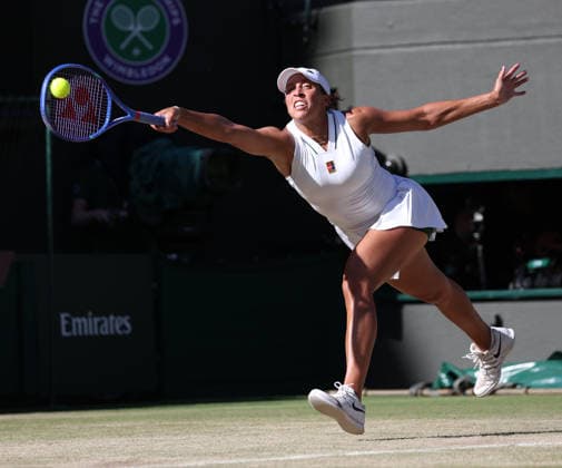American Madison Keys plays a forehand in her match against Czech Linda Moskova at Wimbledon on day eight of the 2026 Wimbledon Championships in London on Monday, July 06, 2026. Moskova won the match 6-4 7-6.  LON2026070655a HUGOxPHILPOTT