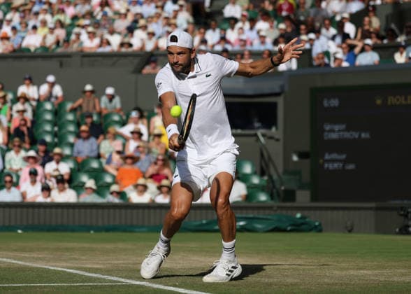 6th July 2026; All England Lawn Tennis and Croquet Club, London, England; Wimbledon Tennis Tournament, Day Eight; Grigor Dimitrov (BUL) with a backhand shot to Arthur Fery (GBR) JohnxPatrickxFletcher