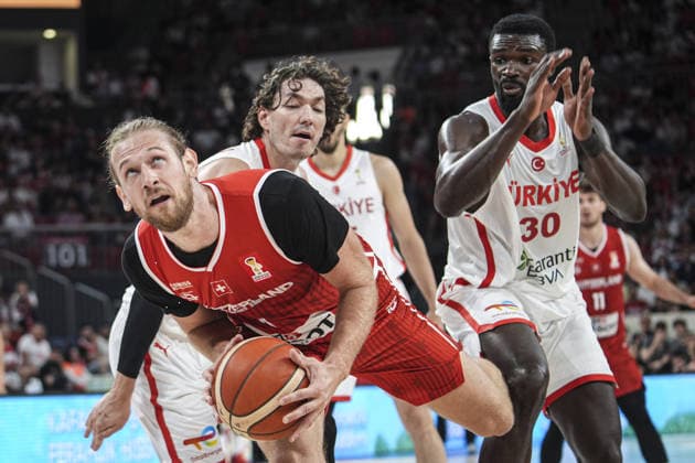 Turkiye v Switzerland - FIBA Basketball World Cup 2027 European Qualifiers ISTANBUL, TURKIYE - JULY 6: Adem Bona (30) of Turkiye in action against Toni Rocak (front) of Switzerland during the first round of the 2027 World Cup European Qualifiers Group C basketball match between Turkiye and Switzerland at Sinan Erdem Sports Hall in Istanbul, Turkiye, on July 6, 2026. Beyza Comert Anadolu Istanbul Turkey. Editorial use only. Please get in touch for any other usage.  Copyright: x2026xAnadoluxBeyzaxComertx