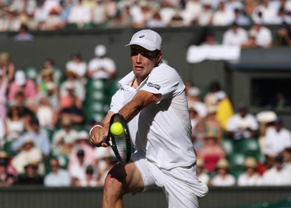 6th July 2026; All England Lawn Tennis and Croquet Club, London, England; Wimbledon Tennis Tournament, Day Eight; Arthur Fery (GBR) with a backhand shot to Grigor Dimitrov (BUL) JohnxPatrickxFletcher