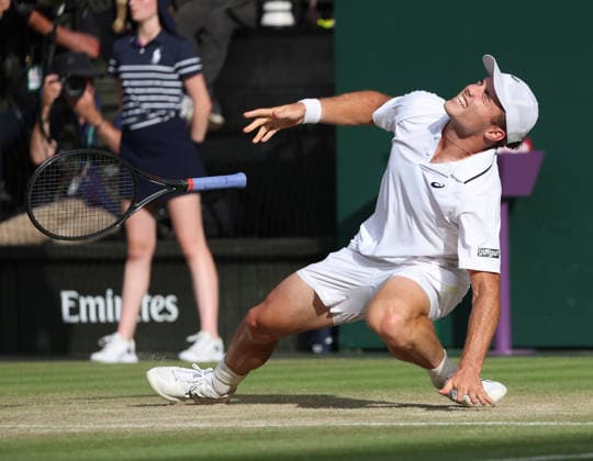 Great Britain s Arthur Fery winces in pain during his match against Bulgarian Grigor Dimitrov at Wimbledon on day eight of the 2026 Wimbledon Championships in London on Monday, July 06, 2026.  LON2026070673 HUGOxPHILPOTT