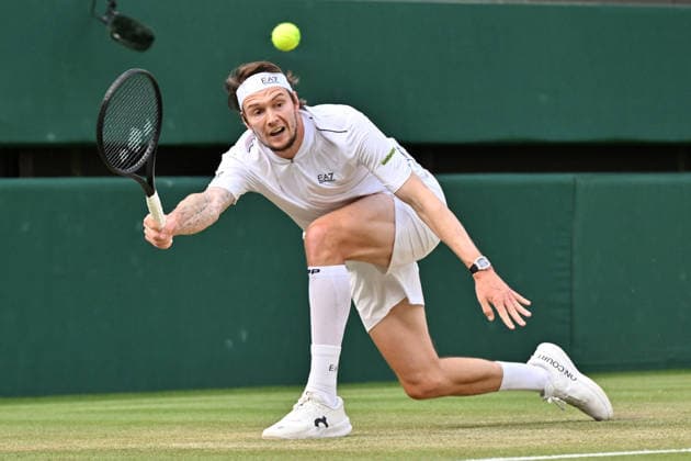 Wimbledon Tennis Championships 2026 - Day 8 LONDON, UNITED KINGDOM - JULY 6: Alexander Bublik of Kazakhstan plays in the men s singles round of 16 match against Taylor Fritz (not seen) of the United States during day 8 of The Wimbledon Tennis Championships at All England Lawn Tennis and Croquet Club on July 06, 2026 in London, United Kingdom. Ray Tang Anadolu London United Kingdom. Editorial use only. Please get in touch for any other usage.  Copyright: x2026xAnadoluxRayxTangx