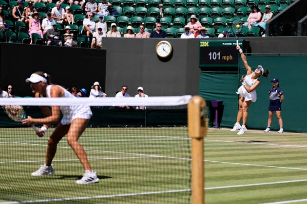 (260706) -- LONDON, July 6, 2026 -- Guo Hanyu (R) Kristina Mladenovic compete during the women s doubles third round match between Guo Hanyu (China) Kristina Mladenovic (France) and Anastasia Detiuc (the Czech Republic) Irina Khromacheva (Russia) at the Wimbledon Tennis Championships in London, Britain, on July 6, 2026. (Photo by Xinhua) (SP)BRITAIN-LONDON-TENNIS-WIMBLEDON-WOMEN S DOUBLES DinendraxHaria 