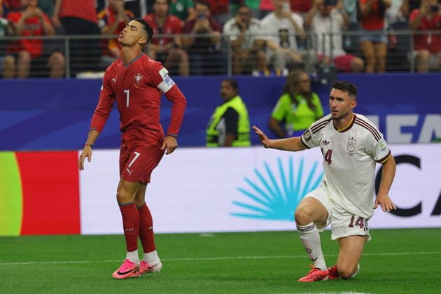 FIFA World Cup, WM, Weltmeisterschaft, Fussball 2026 - Round of 16 - Portugal vs Spain Cristiano Ronaldo (L) of Portugal and Aymeric Laporte of Spain react during the FIFA World Cup 2026 Round of 16 match Portugal against Spain, in Dallas, USA, 06 July 2026. DALLAS United States  Copyright: xCHRISTOPHERxNEUNDORFx