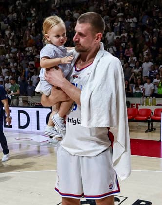 Serbia v Bosnia - FIBA World Cup 2027 Qualifiers Nikola Jokic (L) of Serbia celebrates with his daughter after winning the FIBA World Cup 2027 Qualifiers match between Serbia and Bosnia and Herzegovina at Aleksandar Nikolic Hall on July 06, 2026 in Belgrade, Serbia. Belgrade Serbia Copyright: xSrdjanxStevanovicx x