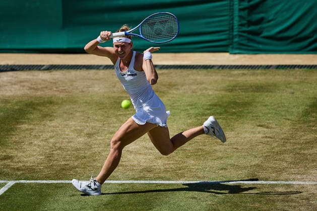July 6, 2026, London, London, Great Britain: Marie Bouzkova of Czech Republic returns with forehand during The Championships Wimbledon , 6.7.2026 in London (All England Lawn Tennis and Croquet Club), Great Britain Tennis 2026: Grand Slam: The Championships Wimbledon: 8th Day:4th Round: MERTENS 6:4 6:4 BOUZKOVA  - ZUMAs343 20260706_zsp_s343_102 Copyright: xMathiasxSchulzx