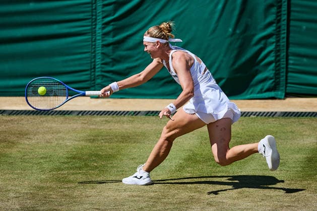 July 6, 2026, London, London, Great Britain: Marie Bouzkova of Czech Republic returns with forehand during The Championships Wimbledon , 6.7.2026 in London (All England Lawn Tennis and Croquet Club), Great Britain Tennis 2026: Grand Slam: The Championships Wimbledon: 8th Day:4th Round: MERTENS 6:4 6:4 BOUZKOVA  - ZUMAs343 20260706_zsp_s343_104 Copyright: xMathiasxSchulzx