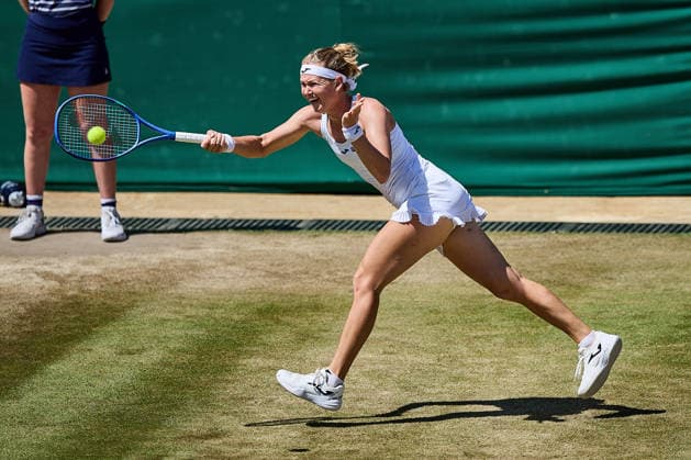 July 6, 2026, London, London, Great Britain: Marie Bouzkova of Czech Republic returns with forehand during The Championships Wimbledon , 6.7.2026 in London (All England Lawn Tennis and Croquet Club), Great Britain Tennis 2026: Grand Slam: The Championships Wimbledon: 8th Day:4th Round: MERTENS 6:4 6:4 BOUZKOVA  - ZUMAs343 20260706_zsp_s343_115 Copyright: xMathiasxSchulzx