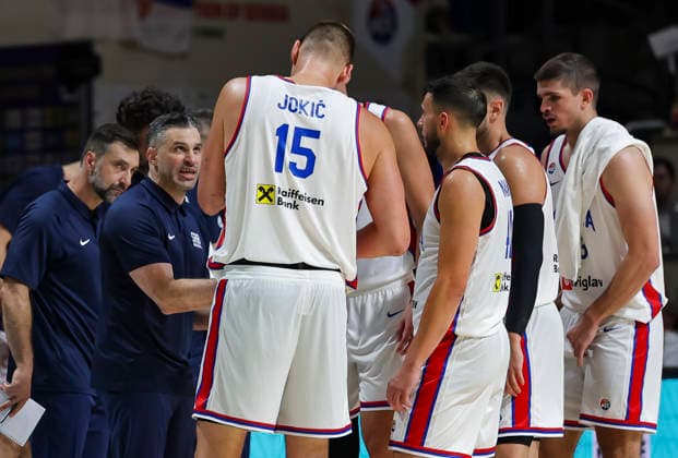 Serbia v Bosnia - FIBA World Cup 2027 Qualifiers Head coach Dusan Alimpijevic (L) of Serbia speaks to players during the FIBA World Cup 2027 Qualifiers match between Serbia and Bosnia and Herzegovina at Aleksandar Nikolic Hall on July 06, 2026 in Belgrade, Serbia. Belgrade Serbia Copyright: xSrdjanxStevanovicx x