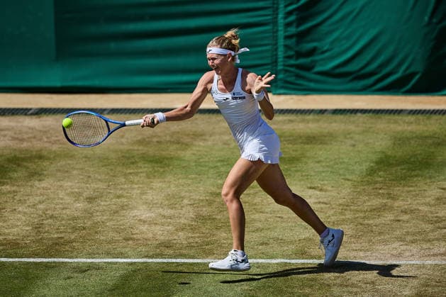July 6, 2026, London, London, Great Britain: Marie Bouzkova of Czech Republic returns with forehand during The Championships Wimbledon , 6.7.2026 in London (All England Lawn Tennis and Croquet Club), Great Britain Tennis 2026: Grand Slam: The Championships Wimbledon: 8th Day:4th Round: MERTENS 6:4 6:4 BOUZKOVA  - ZUMAs343 20260706_zsp_s343_119 Copyright: xMathiasxSchulzx