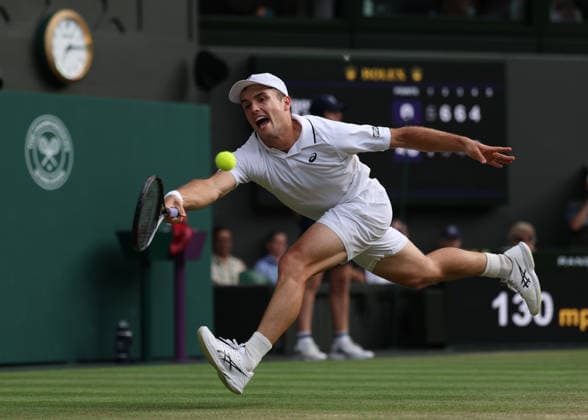 6th July 2026; All England Lawn Tennis and Croquet Club, London, England; Wimbledon Tennis Tournament, Day Eight; Arthur Fery (GBR) with a forehand shot to Grigor Dimitrov (BUL) JohnxPatrickxFletcher