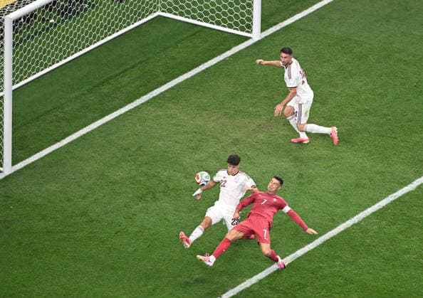 (260707) -- DALLAS, July 7, 2026 -- Cristiano Ronaldo (bottom R) of Portugal vies with Pau Cubarsi (bottom L) of Spain during the round of 16 match between Spain and Portugal at the 2026 FIFA World Cup, WM, Weltmeisterschaft, Fussball at Dallas Stadium in Dallas, the United States, July 6, 2026. ) (SP)U.S.-DALLAS-FOOTBALL-FIFA WORLD CUP-ROUND OF 16-ESP VS POR ChengxMin 