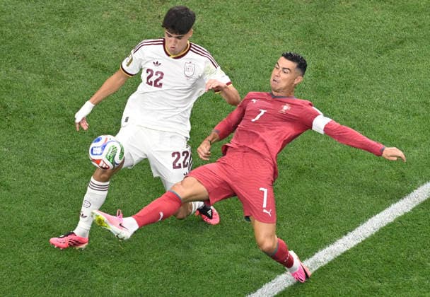 (260707) -- DALLAS, July 7, 2026 -- Cristiano Ronaldo (R) of Portugal vies with Pau Cubarsi of Spain during the round of 16 match between Spain and Portugal at the 2026 FIFA World Cup, WM, Weltmeisterschaft, Fussball at Dallas Stadium in Dallas, the United States, July 6, 2026. ) (SP)U.S.-DALLAS-FOOTBALL-FIFA WORLD CUP-ROUND OF 16-ESP VS POR ChengxMin 