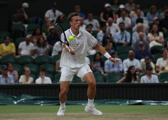 6th July 2026; All England Lawn Tennis and Croquet Club, London, England; Wimbledon Tennis Tournament, Day Eight; Jiri Lehecka (CZE) with a forehand shot to Alexander Zverev (GER) JohnxPatrickxFletcher