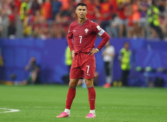 Portugal s Cristiano Ronaldo reacts after a goal by Spain s Mikel Merino in the second half of a Round of 16 FIFA World Cup, WM, Weltmeisterschaft, Fussball match at Dallas Stadium in Dallas, Texas, on Monday, July 6, 2026. Spain defeated Portugal 1-0 and advances to the quarterfinals.  DAL20260706923 CHRISTIANxBRUNSKILL