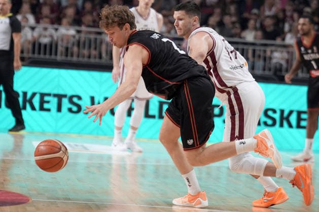 Basketball Latvia-Austria, Riga, Latvia, 06.07.2026, basket, basketball Miro Zapf of Austria and Rihards Lomazs of Latvia in action during FIBA World Cup 2027 European qualifiers group F game between Latvia™s and Austria™s national basketball teams. Riga, Latvia, 06.07.2026. Photo: Roman Koksarov (RKF) Riga Latvia Copyright: xRomanxKoksarovx baskLAT-AUT20260706rk451.JPG