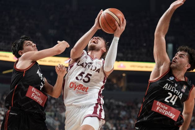 Basketball Latvia-Austria, Riga, Latvia, 06.07.2026, basket, basketball Arturs Zagars of Latvia and Nico Zeleznik and Nordin Kapic of Austria in action during FIBA World Cup 2027 European qualifiers group F game between Latvia™s and Austria™s national basketball teams. Riga, Latvia, 06.07.2026. Photo: Roman Koksarov (RKF) Riga Latvia Copyright: xRomanxKoksarovx baskLAT-AUT20260706rk693.JPG