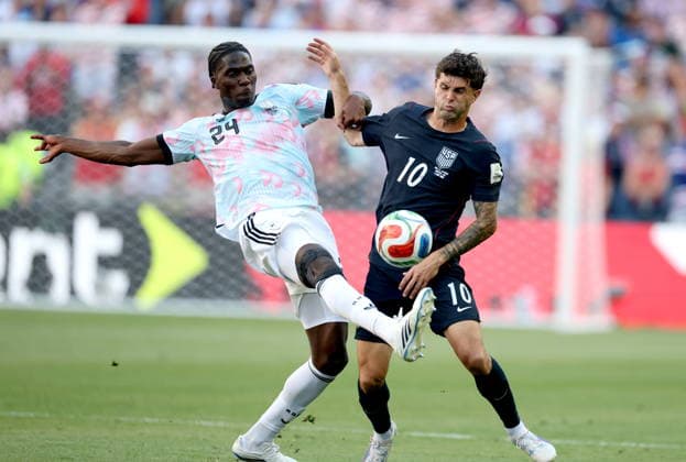 FIFA World Cup, WM, Weltmeisterschaft, Fussball 2026 - Round of 16 - USA vs Belgium Amadou Onana (L) of Belgium and Christian Pulisic of USA in action during the FIFA World Cup 2026 Round of 16 match USA against Belgium, in Seattle, USA, 06 July 2026. SEATTLE United States  Copyright: xCHRISTOPHERxTORRESx
