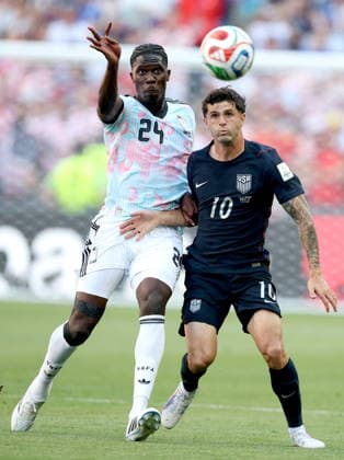 FIFA World Cup, WM, Weltmeisterschaft, Fussball 2026 - Round of 16 - USA vs Belgium Amadou Onana (L) of Belgium and Christian Pulisic of USA in action during the FIFA World Cup 2026 Round of 16 match USA against Belgium, in Seattle, USA, 06 July 2026. SEATTLE United States  Copyright: xCHRISTOPHERxTORRESx