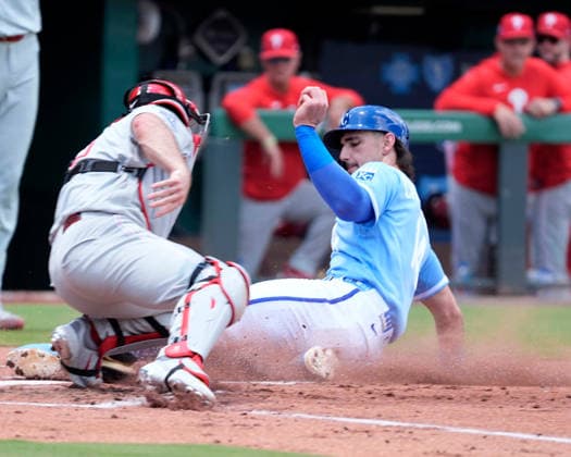 July 06, 2026: Kansas City Royals right fielder Jac Caglianone (14) beats the tag to score in the 1st inning against the Phillies at Kauffman Stadium Kansas City, Missouri. CSM. Kansas City United States - ZUMAc04_ 20260706_zma_c04_036 Copyright: xJonxRobichaudx