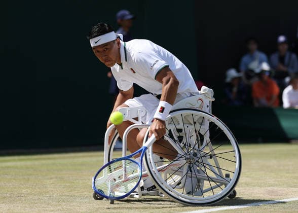 RECORD DATE NOT STATED 7th July 2026; All England Lawn Tennis and Croquet Club, London, England; Wimbledon Tennis Tournament, Day Nine; Tokito Oda (JPN) with a backhand shot to Gordon Reid (GBR) JohnxPatrickxFletcher