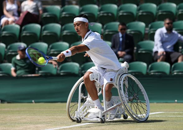 RECORD DATE NOT STATED 7th July 2026; All England Lawn Tennis and Croquet Club, London, England; Wimbledon Tennis Tournament, Day Nine; Tokito Oda (JPN) with a backhand shot to Gordon Reid (GBR) JohnxPatrickxFletcher