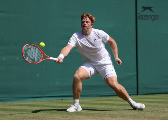 RECORD DATE NOT STATED 7th July 2026; All England Lawn Tennis and Croquet Club, London, England; Wimbledon Tennis Tournament, Day Nine; Jamie Mackenzie (GER) with a forehand shot to Mark Ceban (GBR) JohnxPatrickxFletcher