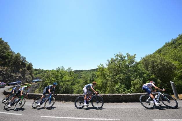 Belgian Jasper Stuyven of Soudal Quick-Step, French Kevin Vauquelin of Netcompany-INEOS and French Alexandre Delettre of TotalEnergies pictured in action during stage 4 of the 2026 Tour de France cycling race, a stage of 181,9km from Carcassonne to Foix, on Tuesday 07 July 2026. The 113th edition of the Tour de France starts on Saturday 4 July in Barcelona, Spain, and will finish in Paris, France on the 26th of July. DAVIDxPINTENS  x180630140x