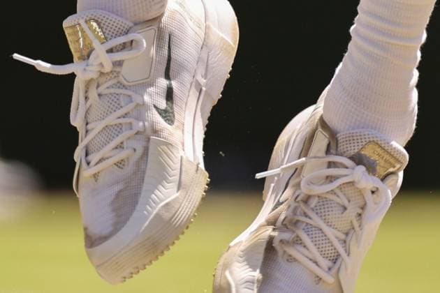 Jannik Sinner wears a Champion metal plate on his Nike trainers during his quarter-final match Wimbledon Tennis Championships, Day 9, The All England Lawn Tennis and Croquet Club, London, UK - 07 Jul 2026London The All England Lawn Tennis and United Kingdom  Copyright: xEllaxLing Shutterstockx 16978028av