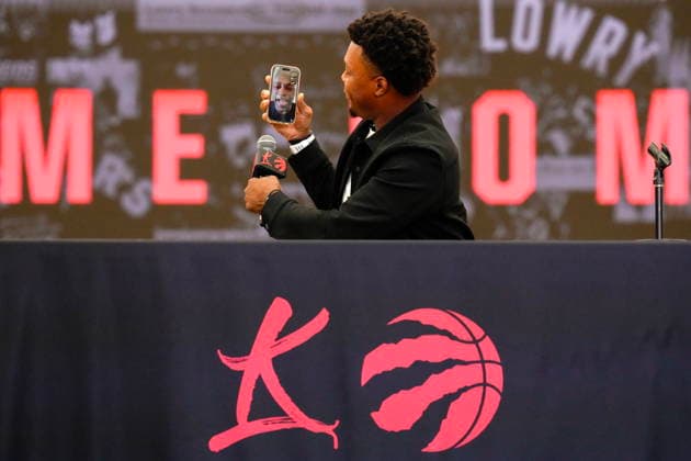 July 7, 2026, Toronto, On, CAN: Kyle Lowry takes a face time call from Vince Carter at a press conference, PK, Pressekonferenz as he signs a one-day contract to retire as a Toronto Raptor, in Toronto, on Tuesday, July 7, 2026. Canada News - July 7, 2026  - ZUMAc35_ 20260707_zaf_c35_037 Copyright: xChrisxYoungx